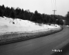 Hilly Landscape with Curved Road