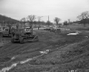 Earth Moving  Machinery Near Paved Road