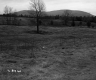 Wire Fence Separating Route 7 and Hilly Pasture Landscape