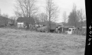 Trucks by Barn