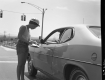 Female Traffic Surveyor and Stopped Car on Williston Road Looking East