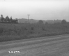 Unpaved Route 118 in Eden, Utility Lines Running to Dwelling