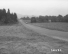Unpaved Route 118 in Eden, Pastures on Both Sides