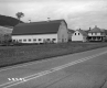Barn by Paved Road