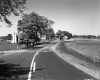 Farm with Silo by Paved Road