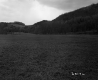 Grass Field Extending to Slope