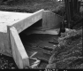 Up-Close View of Concrete Culvert over Downs Brook in Middlesex
