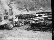 Car Crushing Site In Richmond, Man Operating Machinery