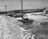 View of Shopping Center in Bennington with Culvert