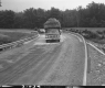 Completed Bridge Construction in Westfield over the East Branch of the Missisquoi River, Looking South from Road with Truck