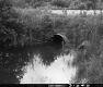Drainage Site off of I-89 in Swanton, Southerly View of Railroad Culvert