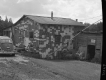 Dwelling in Victory with License Plate Siding, Side View