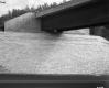 Brick Slope Beneath Bridge