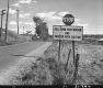 Sign by Dirt Road