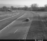 Car on Paved Road