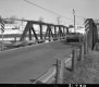 Car on Steel Truss Bridge