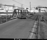 Cars on Steel Truss Bridge