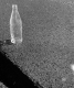 Bottle on Pavement