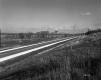 View of Road from Top of Slope in Addison