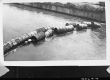 barrels in Lake Champlain Near Pier