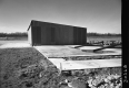 Hangar in Swanton with Gravel Driveway and Airplane