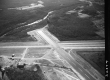 Aerial View of Rutland Runway with River and Forest