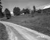 Dirt Road to Houses