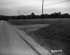 Field by Paved Road
