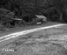 Shed and House by Road