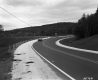 Car on Paved Road