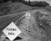 Flagman Ahead Sign