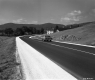 Car on Paved Road