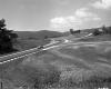 Car on Paved Road