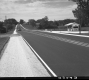 Shed by Paved Road