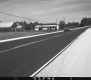 Barn and House by Road