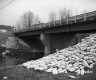 Completed Bridge Construction In Waterville, View from Riverbank