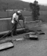 Bridge Maintenance, Bridge Joints Being Replaced by Worker on I-89 Bridges, 2nd Western Bridge