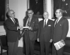 Four Men Standing in Capital Building