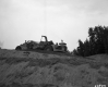 Tractor on I-91 Slope