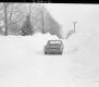 Car on Snowy Road