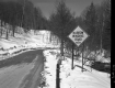 Sign and Snow by Road