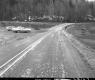 Cars by Paved Road