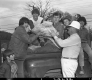 Children in Back of Truck, Clean Up Day, With Gov. Davis