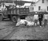 Children at Plainfield School Participate in Green Up Day, Next to Truck