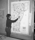 CD Headquarters in Montpelier, Woman in Front of Map