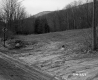 View of Unpaved Road with Sign in Plymouth