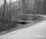 Wooden Bridge by Dirt Road