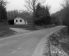 House by Dirt Road