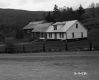 House and Barn by Road