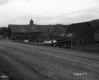 House and Barn by Road